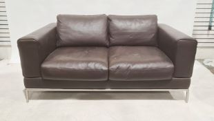Modern two seater brown leather sofa with brushed steel base