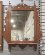 Late 19th/early 20th century rectangular mirror in mahogany frame, with shelf under