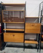 Ladderax unit consisting three uprights, sliding glass units, cocktail unit, further unit with