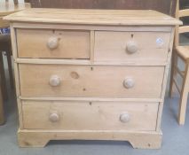 Late 19th century pine chest of two short and two long drawers, the rectangular top with applied