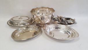 Quantity of silver plate including a large punch bowl with lion mask handles, an oval vegetable dish