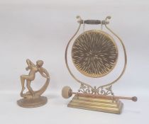Late Victorian/Edwardian brass dinner gong on stand with beater and a metal gold painted Art Deco