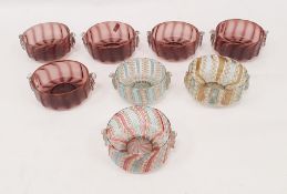 Three Venetian latticino glass ice cream bowls with cherub head mask handles and five amethyst