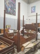 19th century four-poster bed with square section posts to each corner, shaped and carved