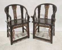 Pair of Chinese armchairs, black painted and gold coloured finish, carved and pierced back splat