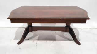 20th century mahogany coffee table on turned end pillar supports united by stretcher, 122cm wide