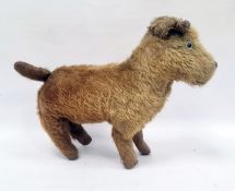 Early 20th century gold plush and straw stuffed toy dog, 32cm long (worn)