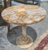 Polished stone circular coffee table on single pedestal and one further (damaged)