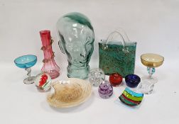 Blue and ochre mottled handbag-shaped glass vase, an aqua glass female bust, a cranberry vase, six