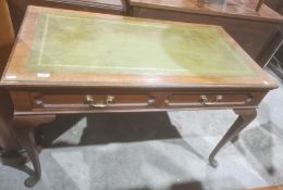 Edwardian library/writing table stamped 'Gillow', with green leather inset top and mahogany frame,