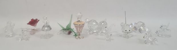 Swarovski model elephant, a similar mouse, an insect, a pig and various other similar models