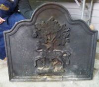 Cast iron fireback, firegrate, firedogs and two pokers