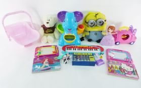 Collection of soft toys and childrens toys to include Etch a Sketch, elephant ball game, small piano