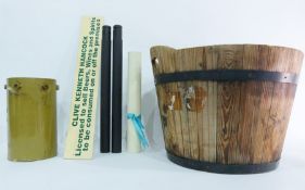 Half-barrel wooden and metal banded planter and a shop sign 'Clive Kenneth Hancock, Licensed to Sell