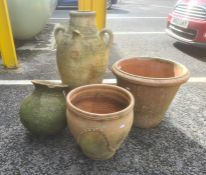 Terracotta garden ornament in the form of an amphora, poppy seed head-shaped planter and two clay