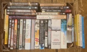 Militairia, four boxes of books and DVDs on the subject of war, including WWII, to include