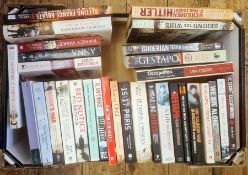 Militaria, three boxes of books and DVDs on the subject of war, to include Burt & Leasor 