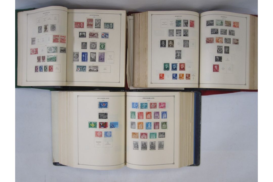 Three part-filled albums of World stamps (3)