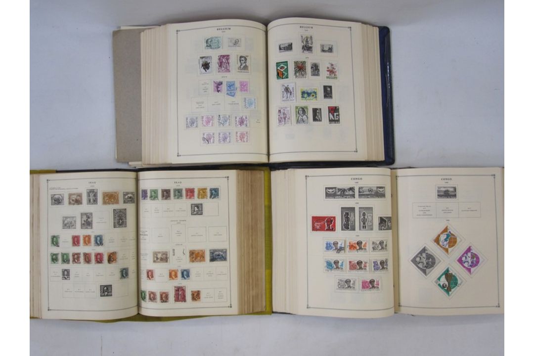Three part-filled albums of World stamps (3)