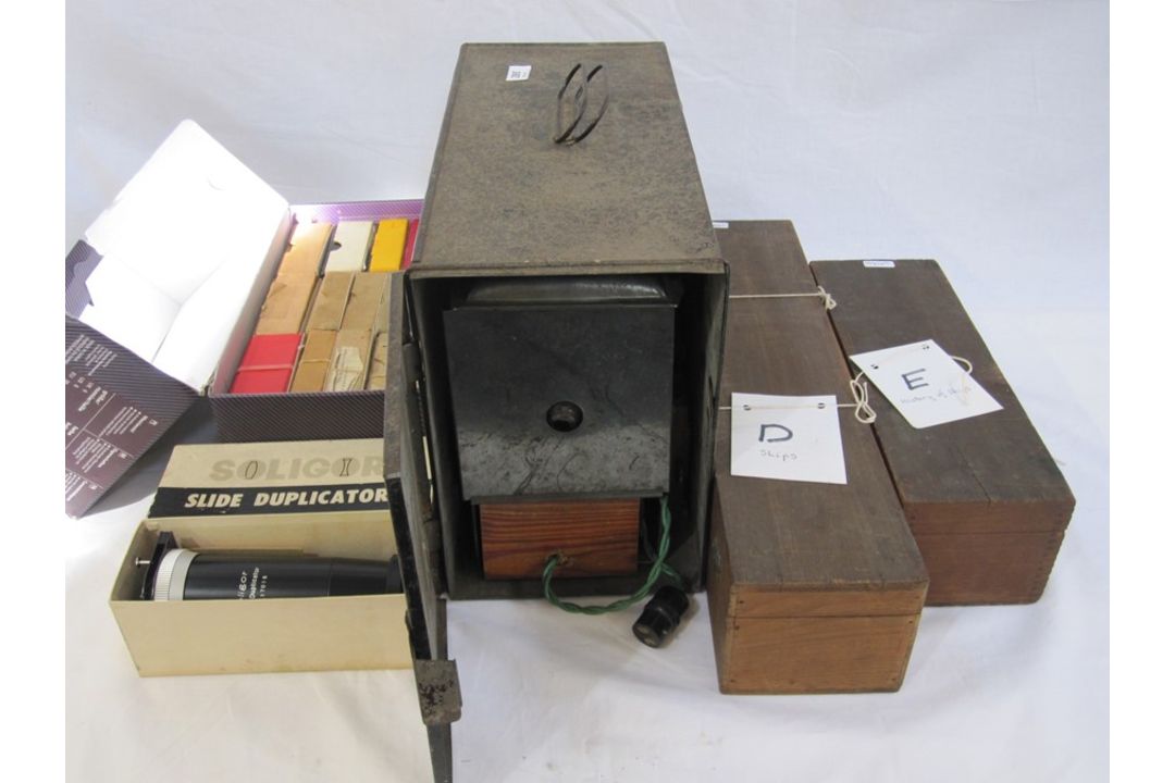 Slide projector (boxed), a Solignor slide duplicator (boxed), various lantern slides to include