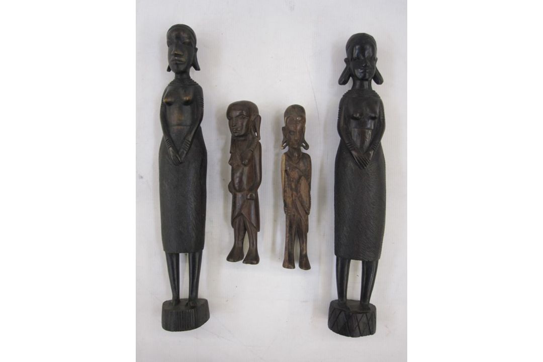 Pair of hardwood carvings from West Africa, female figures and two other wooden figure carvings (4)