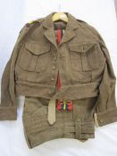 Officer's 1949 patent battle dress uniform with belt, two caps, two berets, leather sword cover