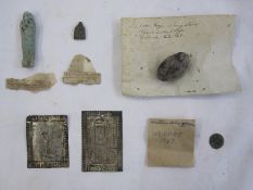 Various items in envelopes to include an 'Egyptian charm from neck of mummy', two 'votive offering