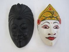Indonesian white dancers mask, 25cm long and a Balanese dance mask, 24.5cm long (2)