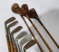 Assorted golf clubs to include left-handed wood-handled clubs, a Gibson & Co Ltd of Scotland King