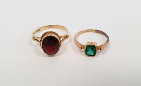9ct gold single stone ring, set with an oval red stone, fingersize N, and a gold-coloured single