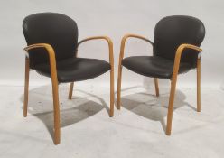 Pair of beech-framed black leather armchairs (2)