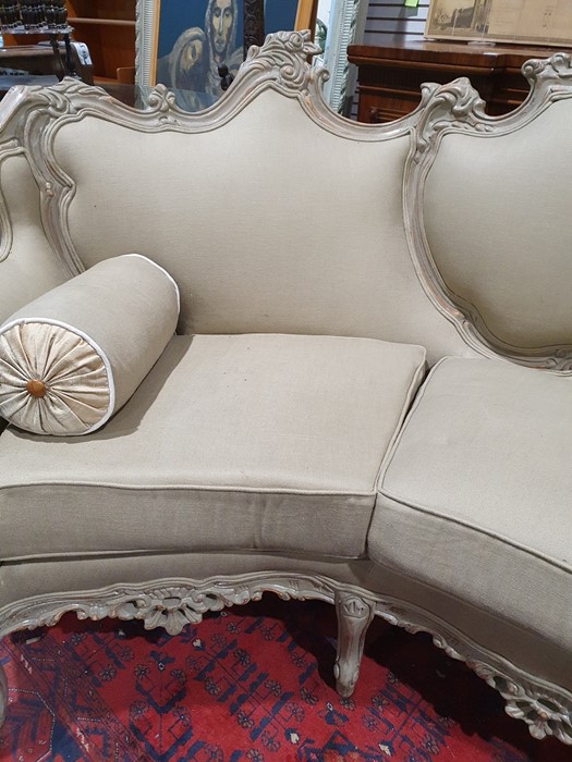 Modern French-style beige painted and upholstered curved three-seat sofa and cushions Condition - Image 6 of 24
