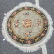 Modern Chinese-style circular rug, the sage ground field with central dragon decoration, the