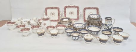 Paragon china part tea service with puce urn and scroll borders, six Royal Worcester china floral