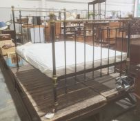 Brass and black painted metal tubular double bed frame, 54
