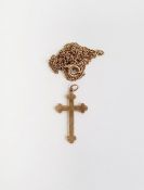 9ct gold small crucifix pendant and the gold-coloured metal chain