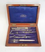 Anniversary clock in glass dome and a draughtsmans set (2)