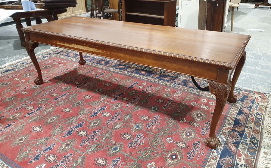 20th century mahogany rectangular dining table, the moulded edge above cabriole legs to claw and