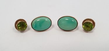 Pair of 9ct gold stud earrings, each set with circular mixed cut peridots, approx 6mm diameter,