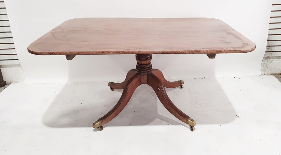 19th century mahogany pedestal table, the rectangular top with rounded corners, rosewood banded,