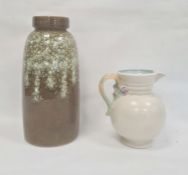 Clarice Cliff pottery jug having everted rim, pink and purple floral mounted and foliate scroll