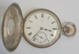 Silver half hunter pocket watch, the enamel dial with roman numerals and subsidiary seconds dial,
