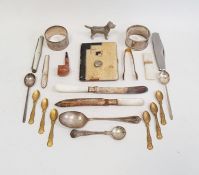 Silver napkin ring with engine-turned decoration, another silver napkin ring of plain form with