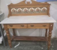Early 20th century marble-topped washstand, the tiled back above rectangular marble top, two