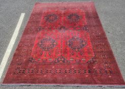 Modern Eastern-style red ground rug with stepped border, 203cm x 195cm