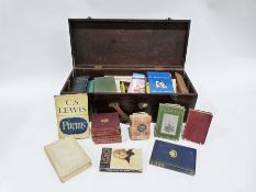 Wooden trunk and contents of books including poetry, fiction, etc.