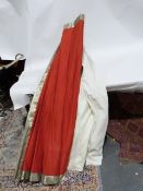 Red silk blind with gold coloured thread border, approx. 182cm wide and a matching