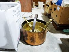 Copper coal scuttle, a brass jam pan, a pair of brass firedogs, copper jardinière and various