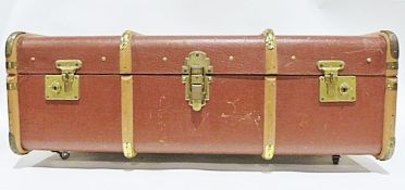 Vintage wooden bound trunk with added castors