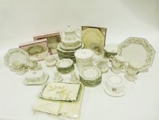 Quantity of Johnson Bros tableware decorated with roses and ribbons to include bowls, biscuit jar